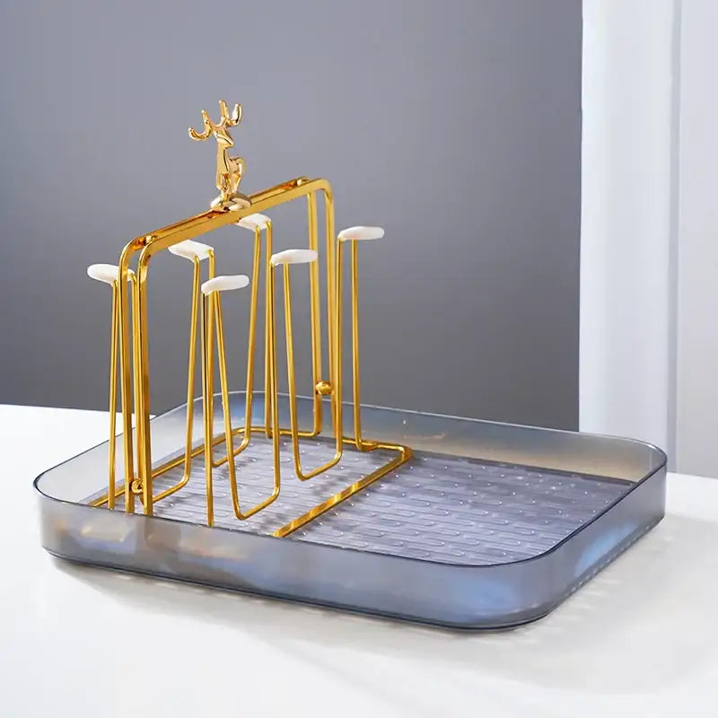 European gold deer glass storage rack with gold metal frame white silicone grips and translucent gray plastic base cup holder
