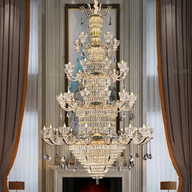 A duplex european crystal chandelier with gold-toned metalwork and hanging crystals for staircase lighting