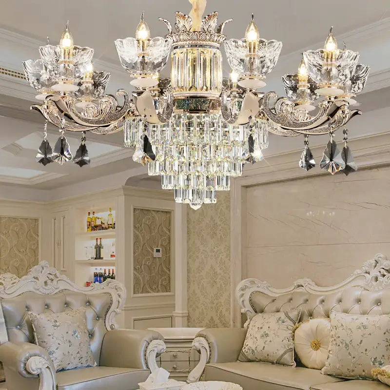 Opulent European gold duplex European crystal chandelier with silver-toned arms and cascading clear glass prisms