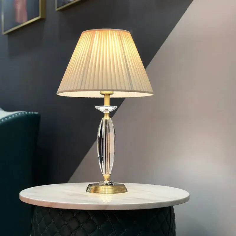 Elegant crystal floor lamp with gold-finished base and cream fabric shade perfect for European retro living rooms