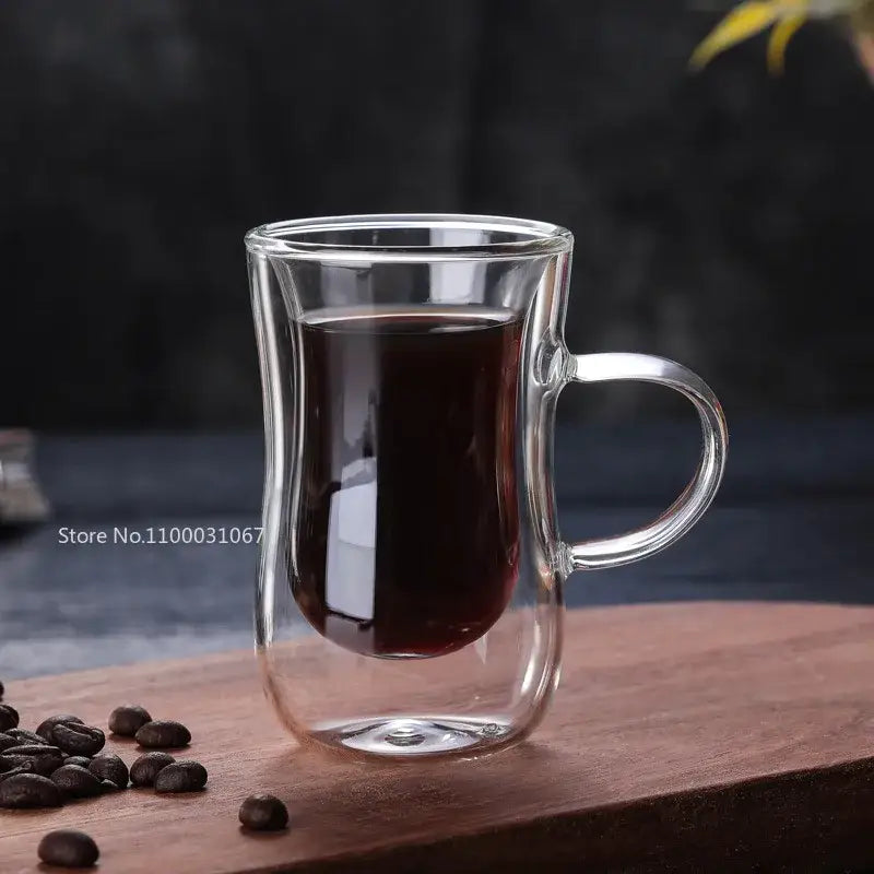 European style clear double glass insulated tea cup filled with dark liquid for kitchenware use