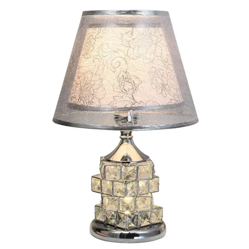 Silver-toned decorbites crystal table lamp with tiered clear faceted squares and sheer floral shade for bedroom decor