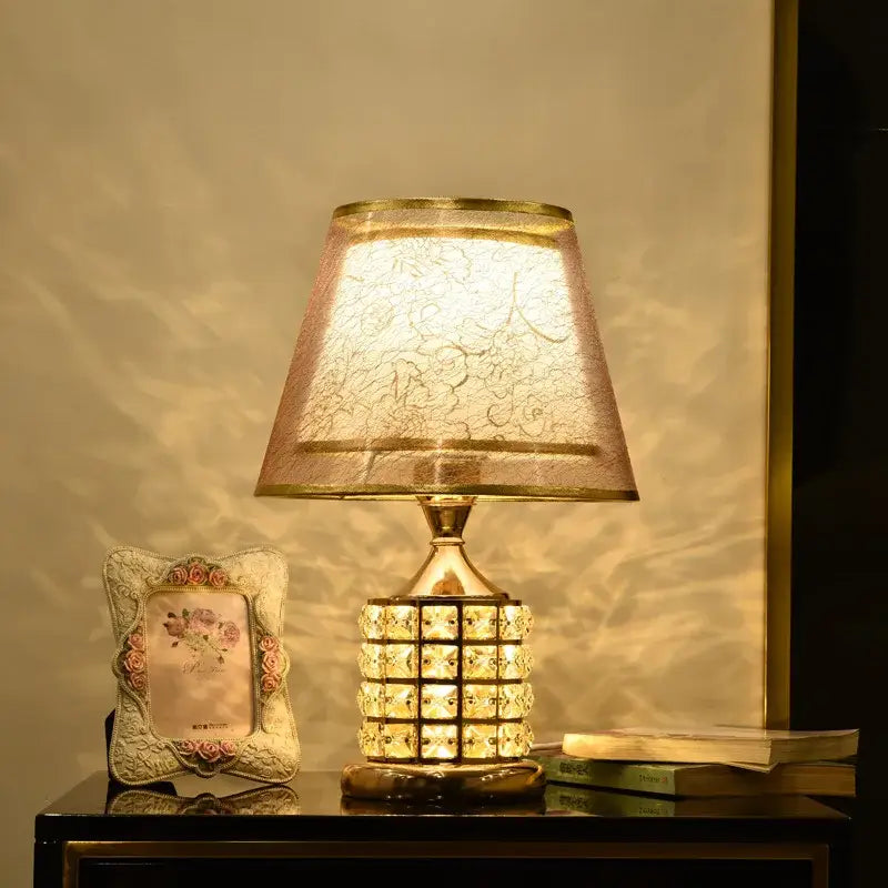 European style gold crystal table lamp with a sheer patterned pinkish gold shade for bedroom decorbites crystal table use