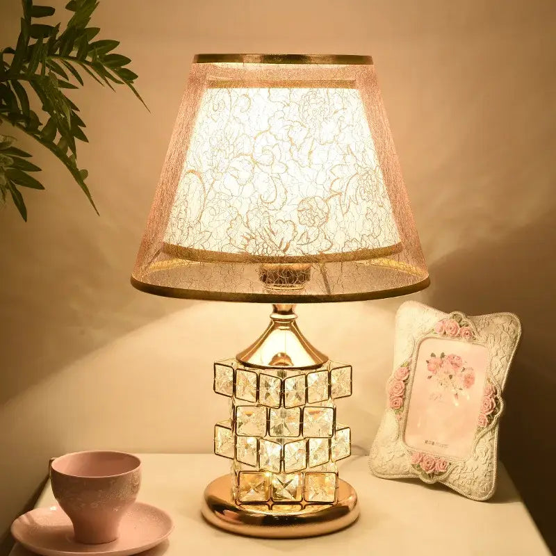 European style gold-toned crystal table lamp with lace-patterned pinkish-beige shade for bedroom decorbites crystal table lamp