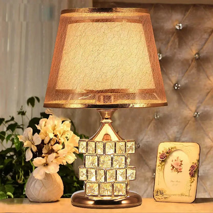 European style gold crystal table lamp with textured warm-lit fabric shade for bedroom decorbites crystal table lamp