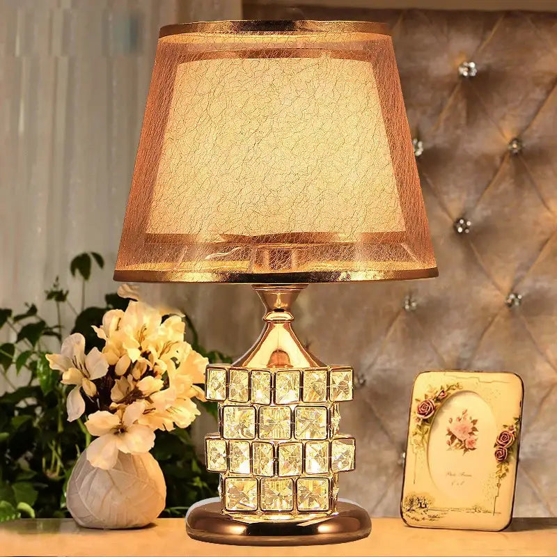 European style gold crystal table lamp with textured warm-lit fabric shade for bedroom decorbites crystal table lamp