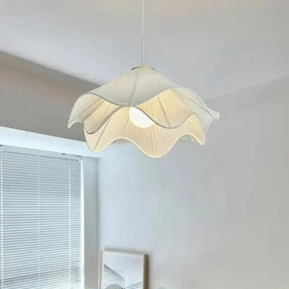 Fabric petal pendant light by decorbites features delicate off-white fabric with soft ruffled petals for dining room decor