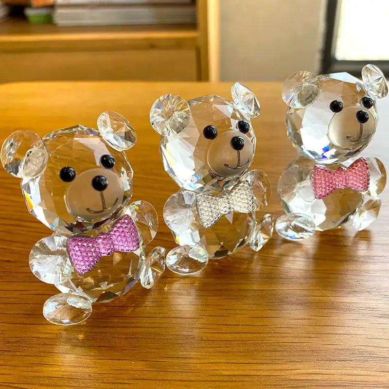 Three faceted clear crystal teddy bear figurines with jeweled pink and silver bow ties for bedroom decor