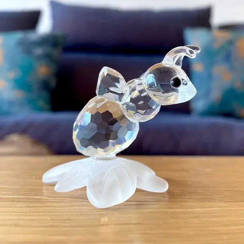 Faceted clear glass bee figurine with black eye and translucent wings paired with leaf glass figurine decorbites crystal bee decorbites crystal living room decor