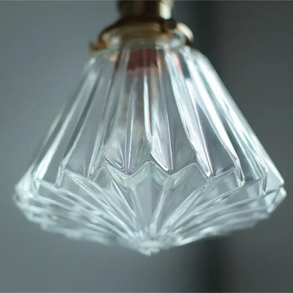 Faceted clear glass copper pendant lamp with brass fixture ideal for dining room and kitchen decorbites pendant lamp