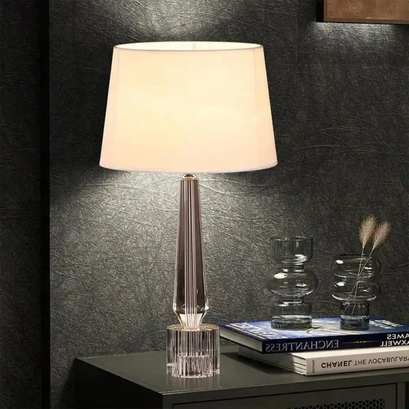 Faceted crystal table lamp with remote control featuring a sleek faceted base and off-white shade for bedroom decorbites crystal table