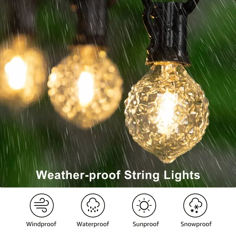 Faceted glass g40 string lights with golden textured globe bulbs on a black outdoor garden string light set
