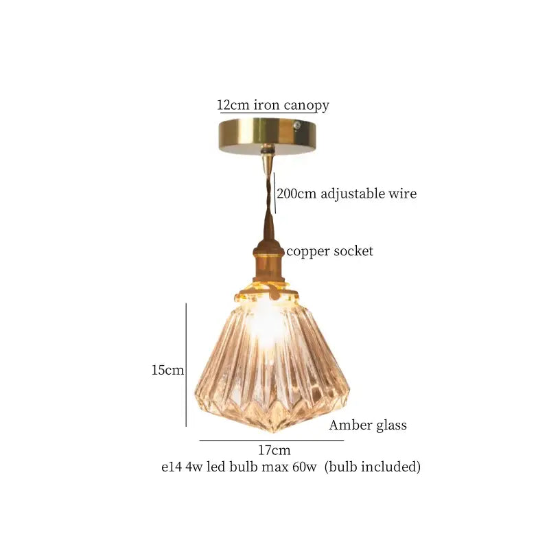 Faceted glass pleats led pendant light with amber glass shade, brass-finished iron canopy, and copper socket for dining room