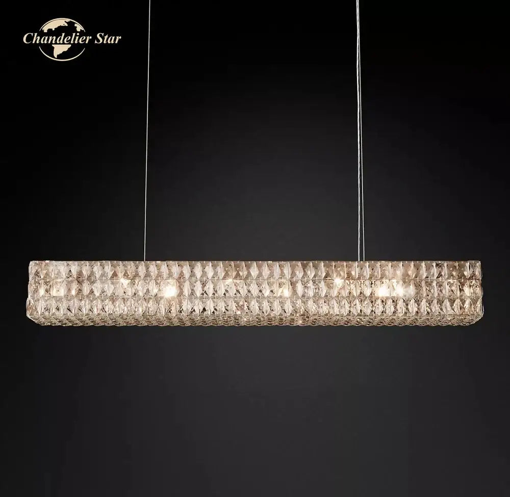 Faceted gold crystal led linear chandelier with warm glowing lights and modern design for dining room decorbites crystal led