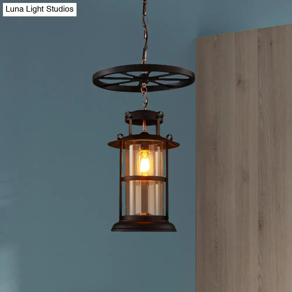 Farmhouse Black Single Light Pendant Ceiling Light with Clear Glass Cylinder and Iron Wheel Fixture