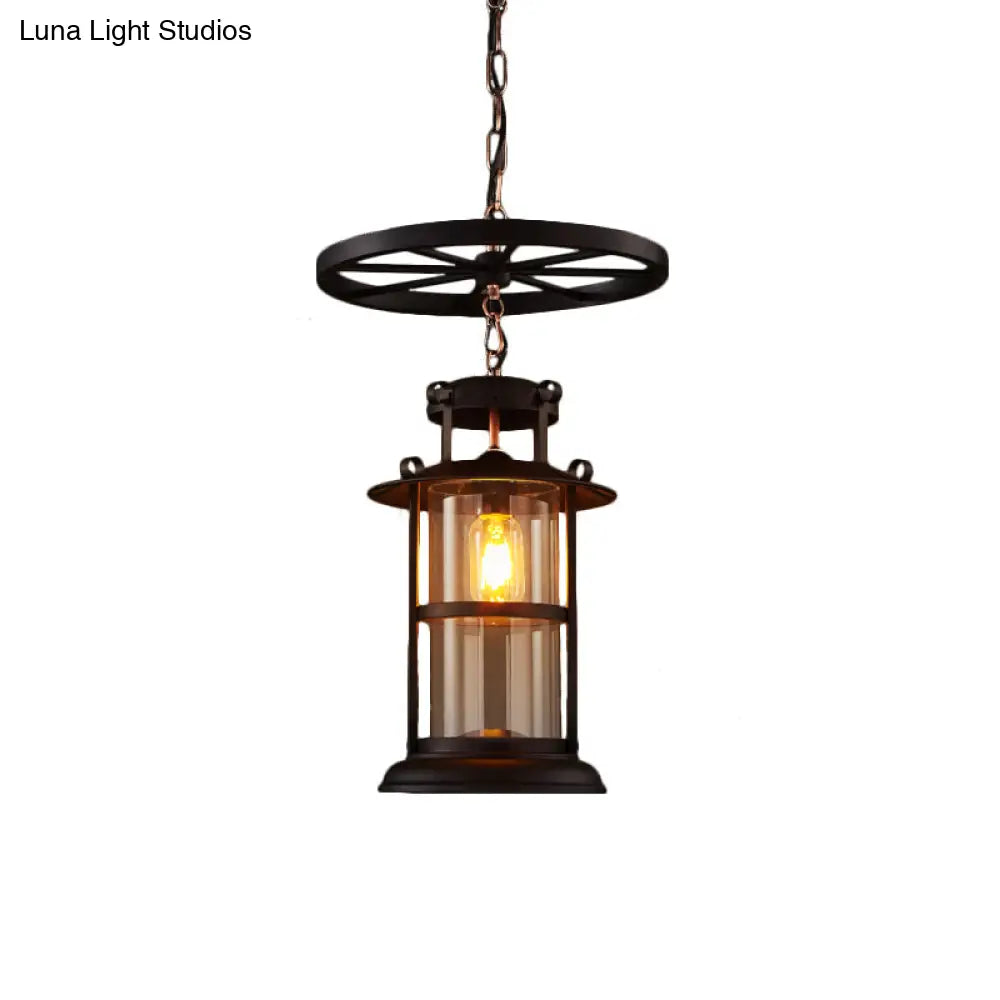 Farmhouse Black Single Light Pendant Ceiling Light with Clear Glass Cylinder and Iron Wheel Fixture