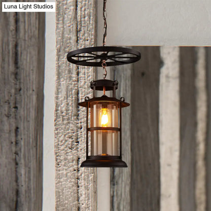 Farmhouse Black Single Light Pendant Ceiling Light with Clear Glass Cylinder and Iron Wheel Fixture