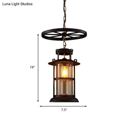 Farmhouse Black Single Light Pendant Ceiling Light with Clear Glass Cylinder and Iron Wheel Fixture