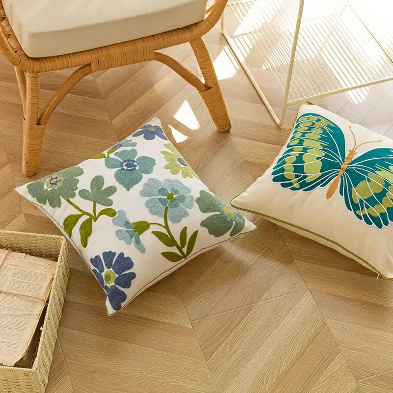 White throw pillow cover with embroidered blue and green floral pattern for decorbites decorative farmhouse decor