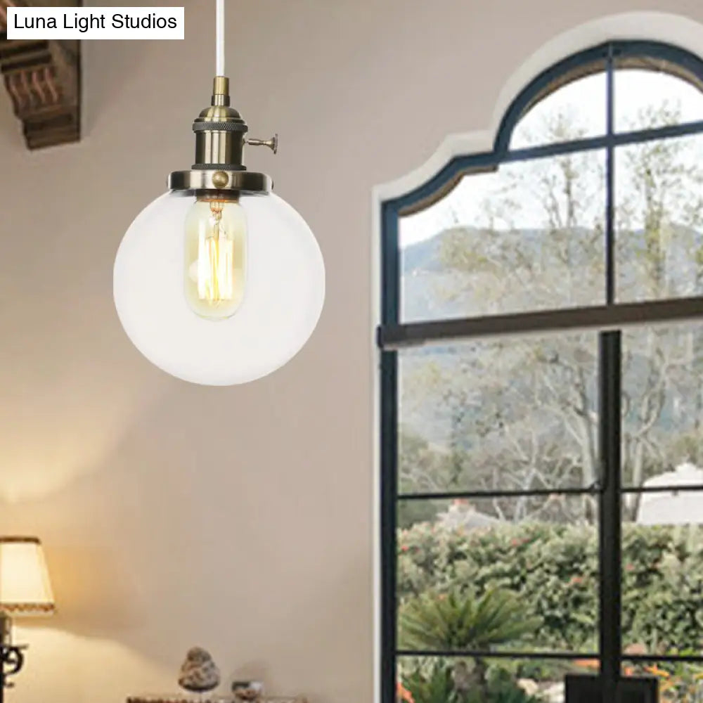 Farmhouse Orbit Pendant Light with Amber/Clear Glass and Adjustable Cord in 3 Elegant Finish Options