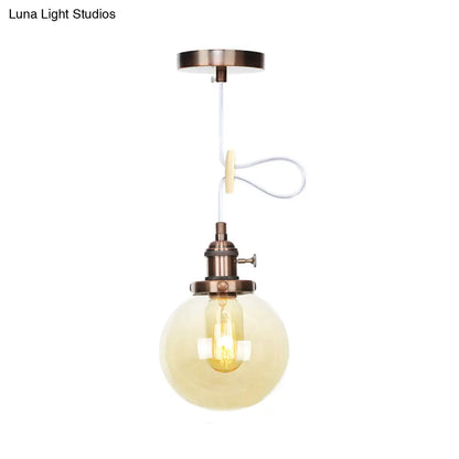 Farmhouse Orbit Pendant Light with Amber/Clear Glass and Adjustable Cord in 3 Elegant Finish Options