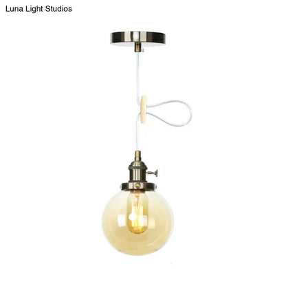 Farmhouse Orbit Pendant Light with Amber/Clear Glass and Adjustable Cord in 3 Elegant Finish Options