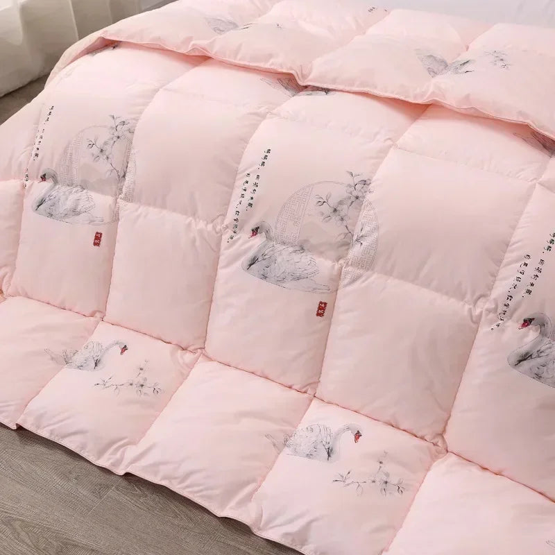 Pink quilt with embroidered swans and chinese calligraphy made of white goose down for winter bedding