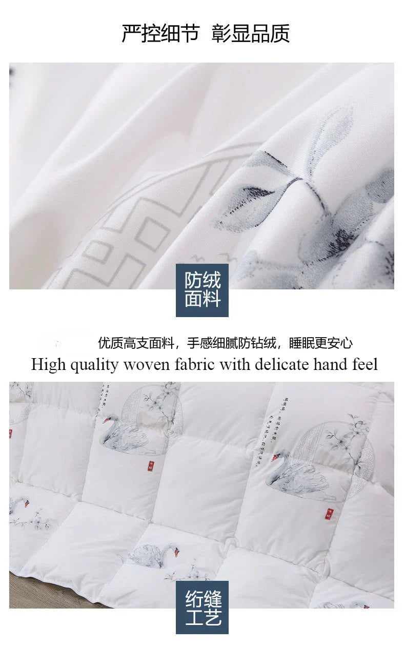 White goose down quilt with delicate gray floral embroidery on soft high-quality woven fabric for comfortable winter bedding