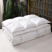 White goose down quilt with subtle gray floral embroidery and vertical chinese characters for winter bedding