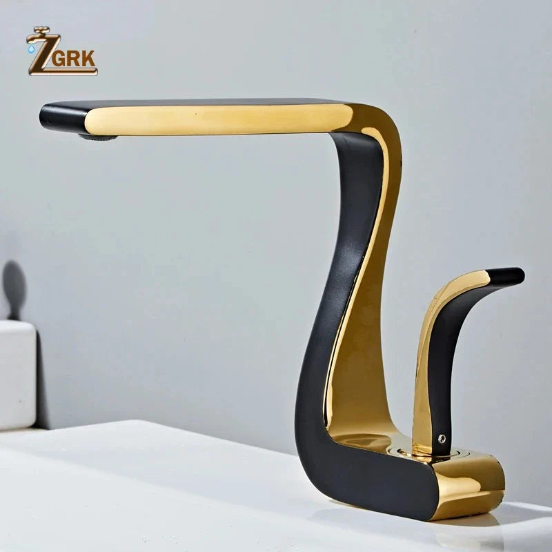 Gold and black single hole brass faucet with sleek curved design housing material for luxury bathroom use