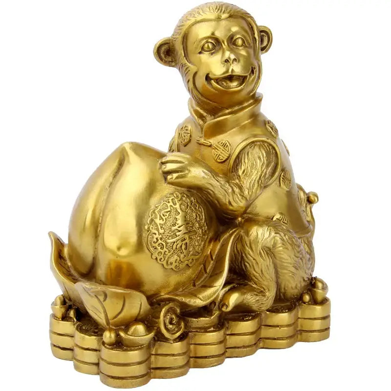 Golden brass copper monkey figurine in traditional chinese attire seated with peach and coins for living room decor