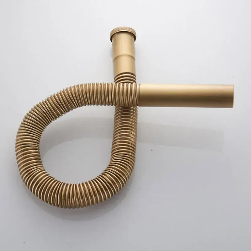Gold-colored flexible chrome brass siphon sink drain pipe with corrugated hose and rigid end cap for kitchen sink drain