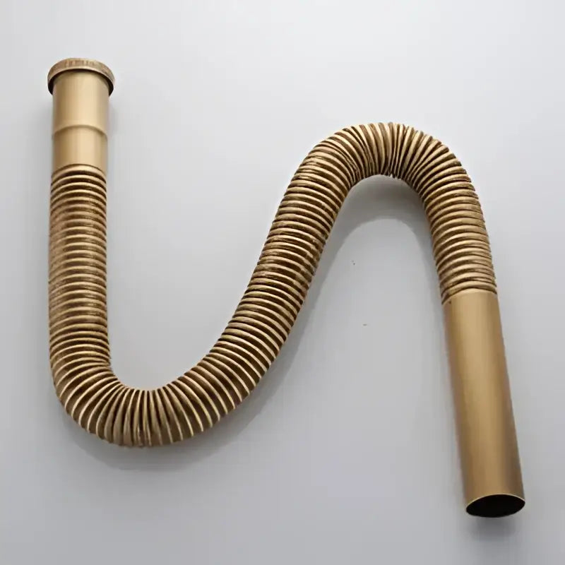 Gold-colored flexible chrome brass siphon sink drain pipe with smooth cylindrical end caps for kitchen sink drain