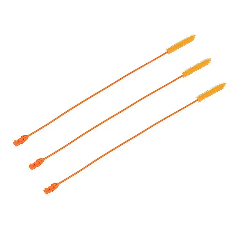 Three bright orange plastic drain cleaner brushes with flexible bristled heads and molded handles for kitchen clogs