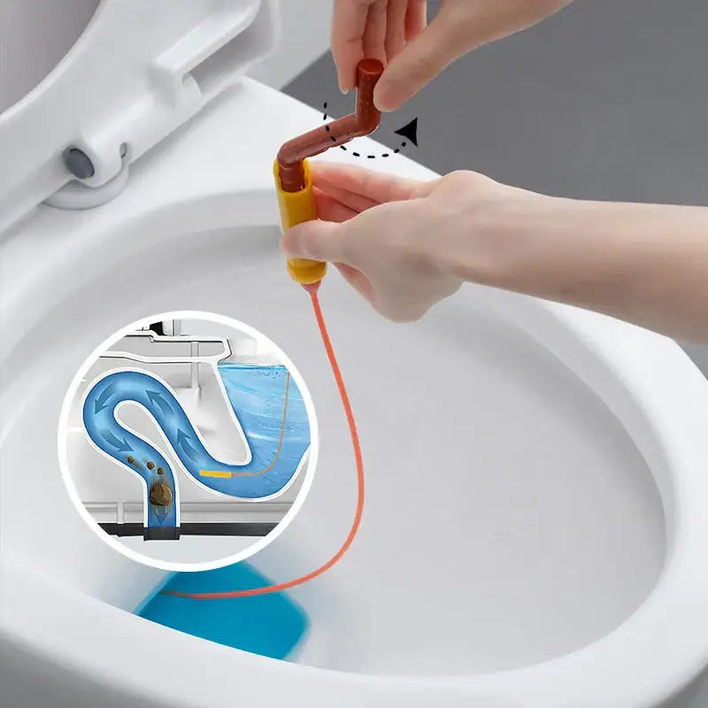 Flexible orange and yellow drain cleaner brush with a flexible red cord for kitchen clog removal and drain cleaning