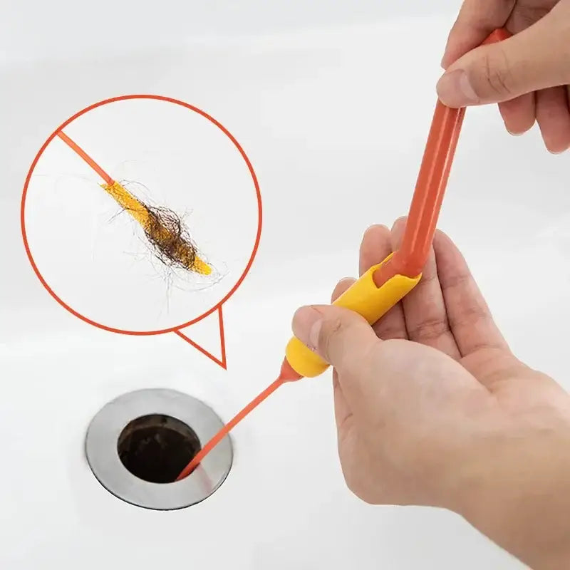 Flexible orange and yellow plastic decorbites drain cleaner brush with tapered tip for sink hair and debris removal