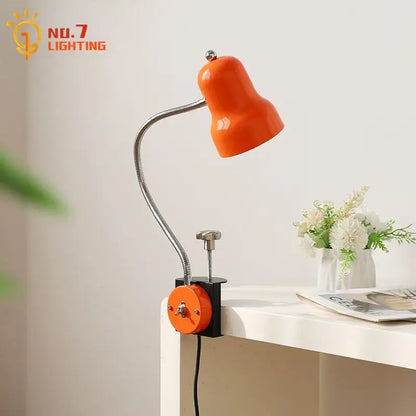 Vibrant orange bell-shaped decorbites adjustable led desk lamp with flexible gooseneck and black clamp base for reading