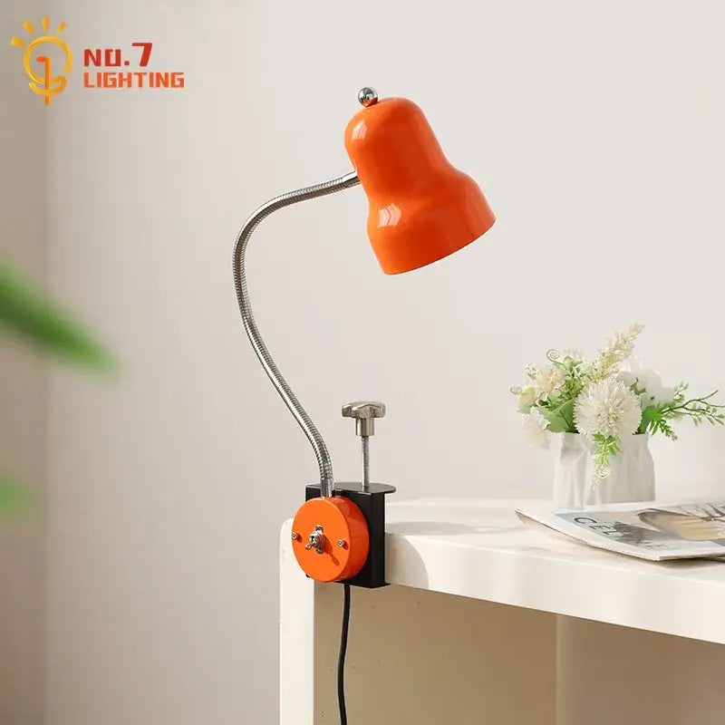 Vibrant orange bell-shaped decorbites adjustable led desk lamp with flexible gooseneck and black clamp base for reading