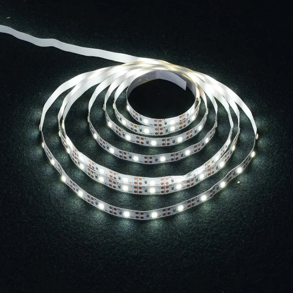 Coiled white flexible usb led light strips with bright evenly spaced bulbs and adhesive backing for tv bedroom lighting