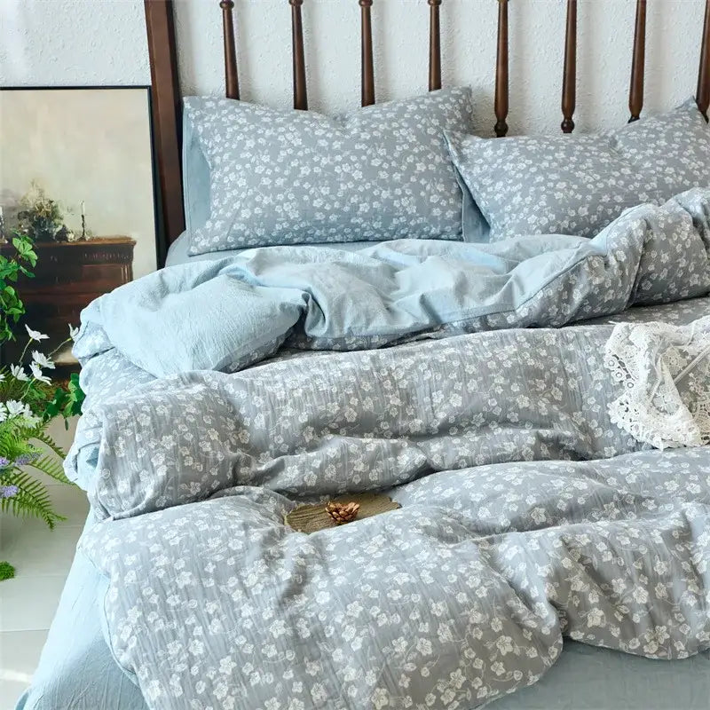 Light blue and white floral patterned duvet cover set in soft textured cotton fabric for bedroom use