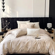 Beige floral patterned satin egyptian cotton bedding set with embroidered muse land pillow for bedroom use