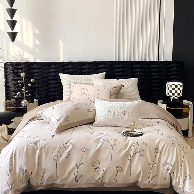 Beige floral-patterned satin egyptian cotton bedding set with embroidered muse land pillow for bedroom use
