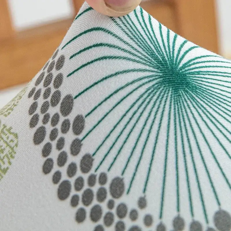 White fabric elastic print chair cover with green geometric lines and gray dots for dining room use