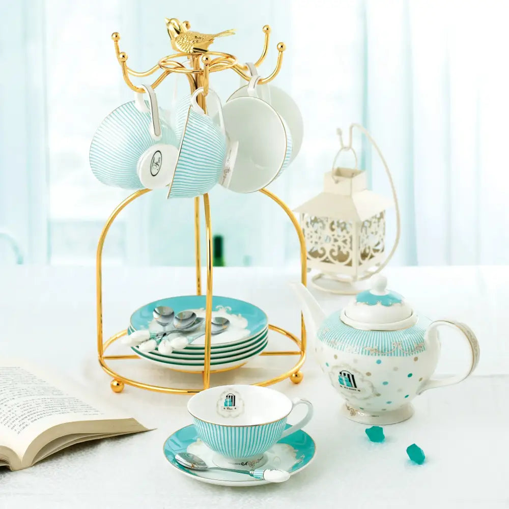 A delicate turquoise and white bone china tea set teacup with vertical stripes resting on a matching saucer