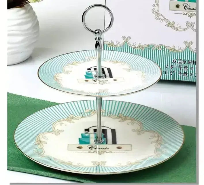Two-tiered bone china tea set dessert stand with turquoise and cream stripes and gold trim for elegant dining rooms