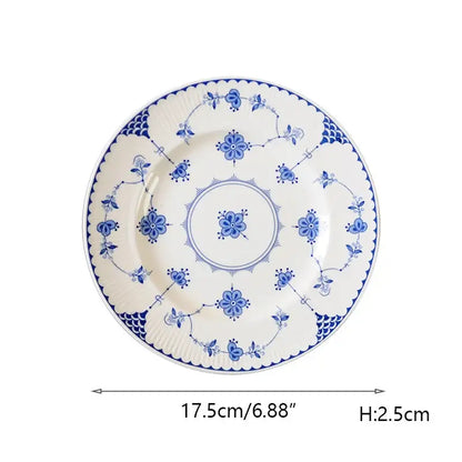 Floral blue and white ceramic dinner plate with intricate blue floral and vine patterns for decorbites ceramic dinner use