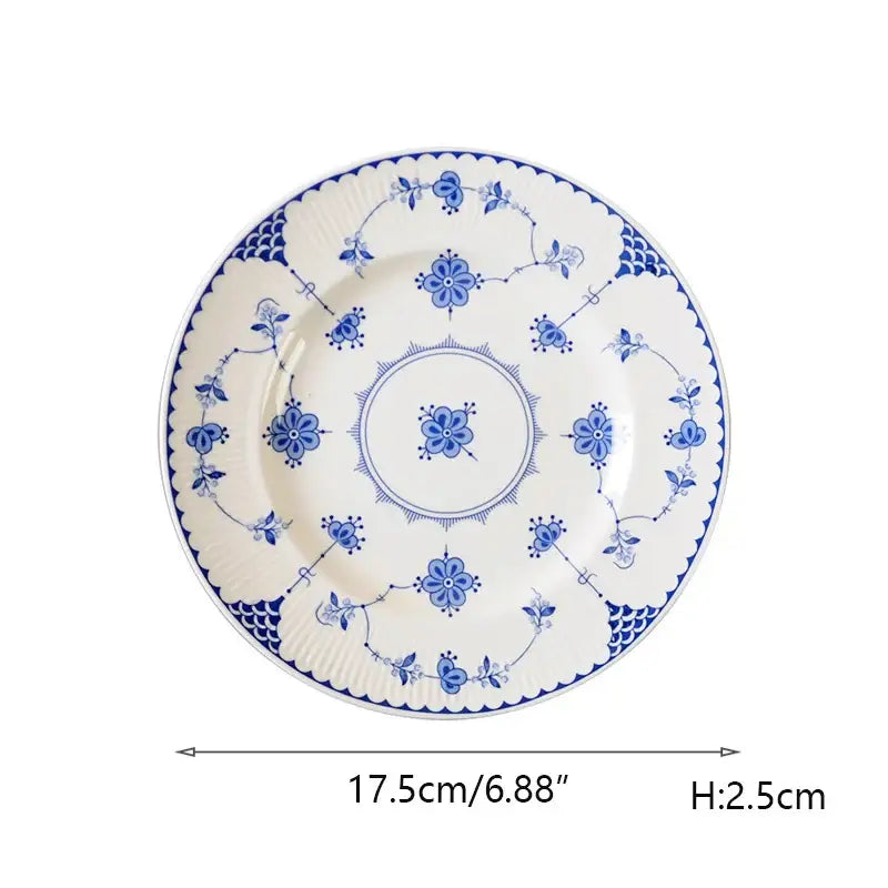 Floral blue and white ceramic dinner plate with intricate blue floral and vine patterns for decorbites ceramic dinner use