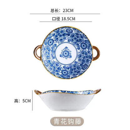 A blue and white porcelain decorbites ceramic double ear ramen soup bowl with gold-rimmed handles and floral patterns