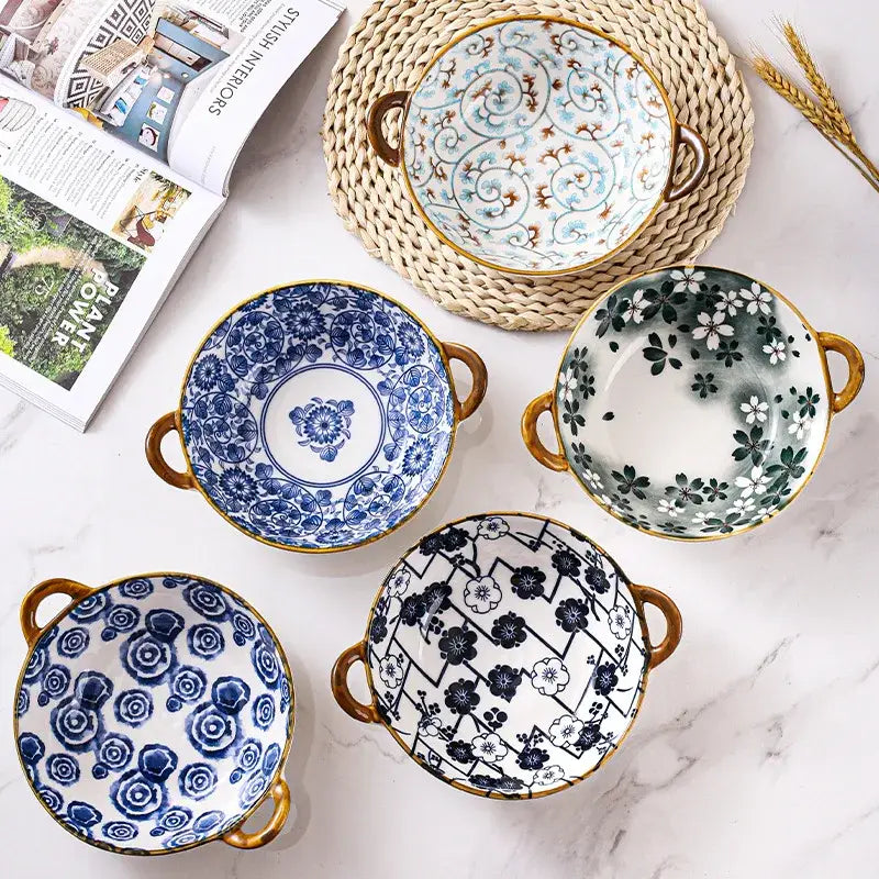 Blue and white ceramic double ear ramen soup bowls with gold handles featuring floral and geometric patterns decorbites ceramic double