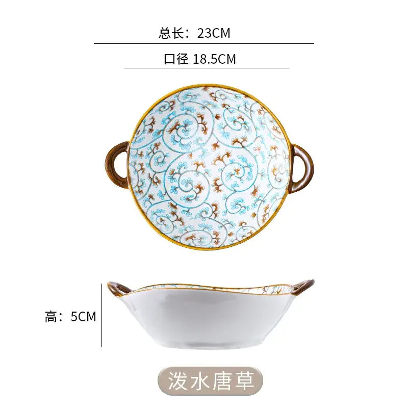 A white ceramic double ear ramen soup bowl with blue and gold swirling pattern and brown handles by decorbites ceramic double